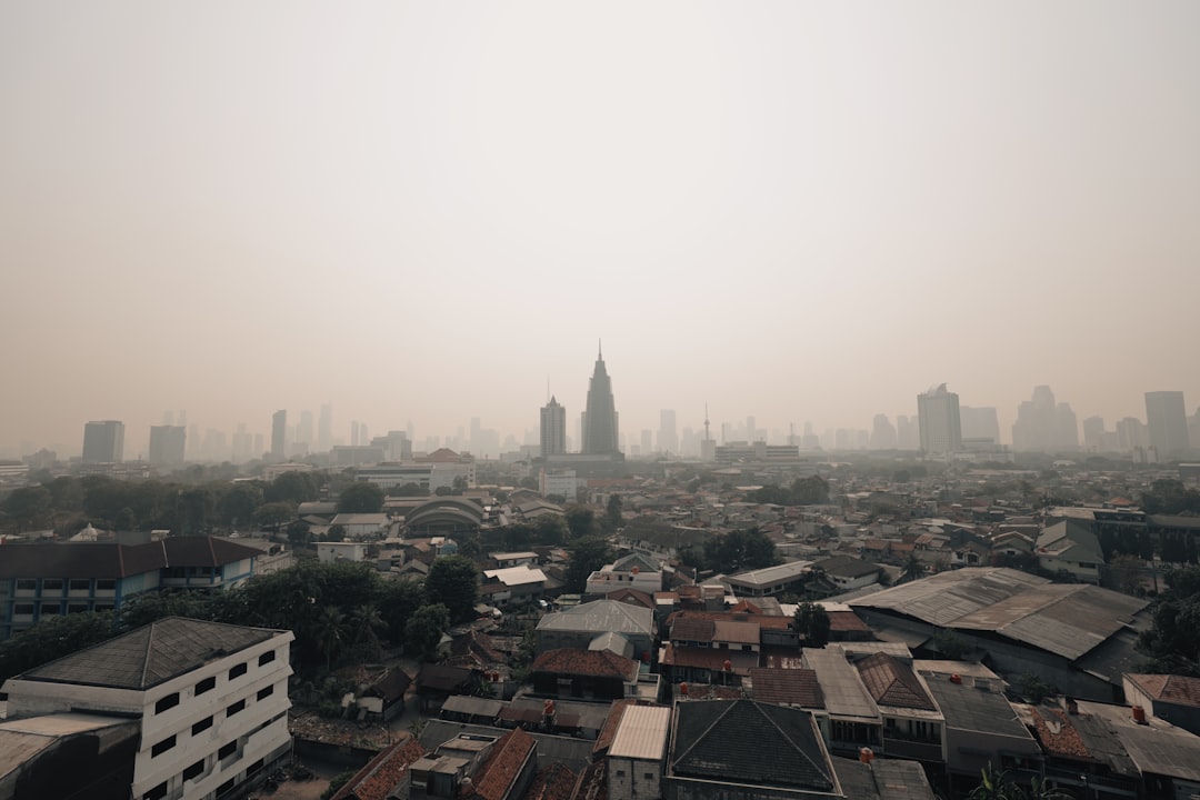 a view of a city with tall buildings