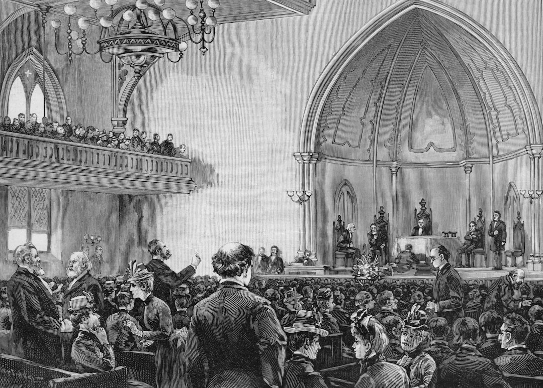 People gathered in a large, ornate church hall.