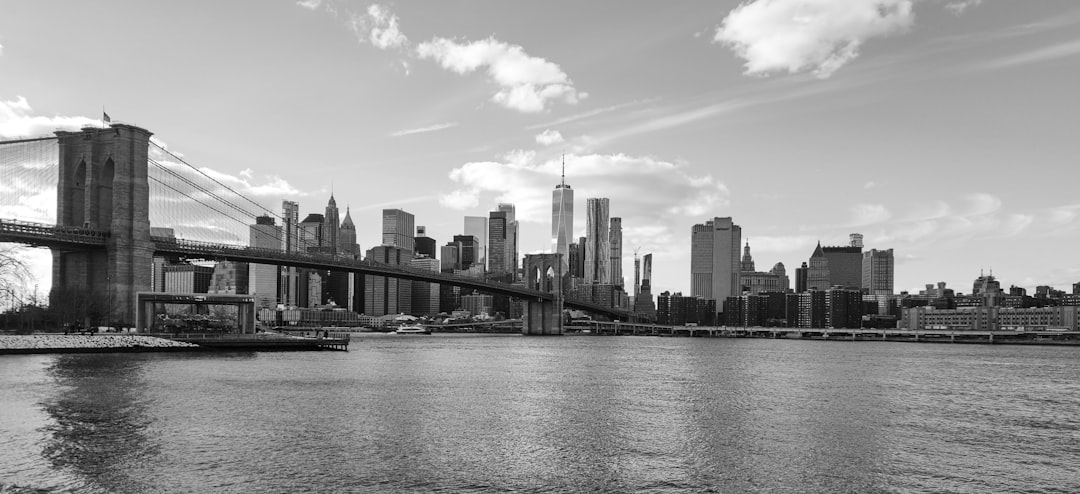 A black and white photo of the brooklyn bridge