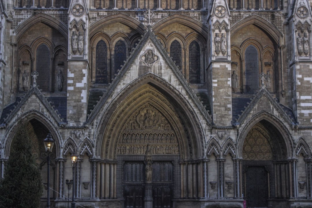 a large cathedral with a clock on the front of it